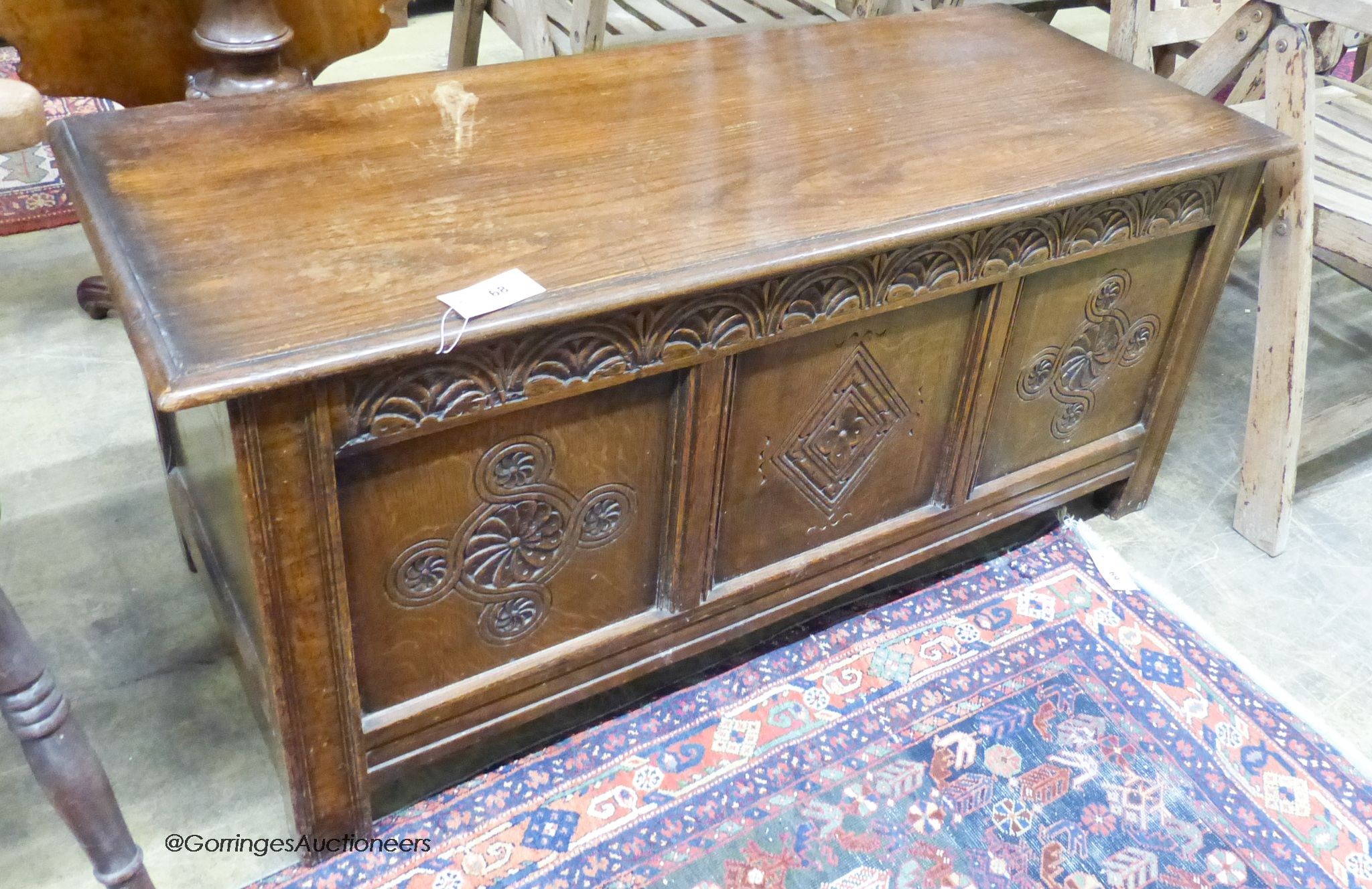 An 18th century style oak coffer, length 116cm, depth 48cm, height 52cm